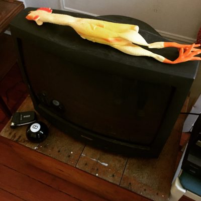 Rubber chicken and an old CRT television. Can't get much better set design than this.
